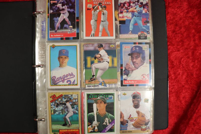 Photo 1 of Over 200 Baseball cards in binder (some stars)
