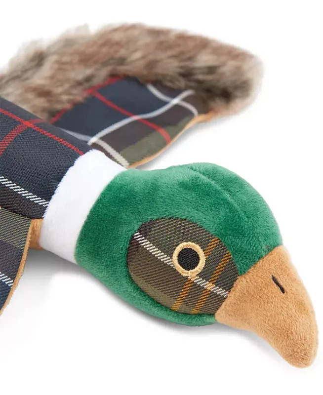 Photo 5 of Barbour Plaid Logo Pheasant Squeaker Stuffed Dog Toy. Made in Germany. Your pup will be eager to bird-dog this one! This soft Barbour features a fetch-ready shape and a fun squeaker inside. Approx. dimensions: 36 cm x 31 cm x 6 cm. Squeaker inside. Shell: