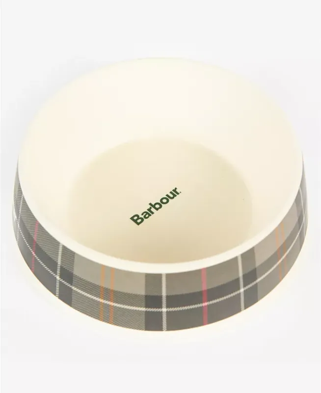 Photo 1 of Bamboo dog bowl in Barbour's classic tartan print with Barbour logo. Made in Germany
Dimensions - 6.9" L x 6.9" W x 2.1" H. Embossed logo. Durable bamboo construction. Bamboo dog bowl in Barbour's classic tartan print with Barbour logo. Bamboo, Corn, Resi