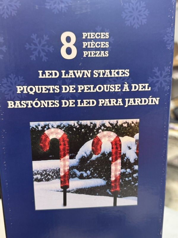 Photo 2 of Candy Cane Christmas Pathway Lights LED Lawn Stakes 8 Pieces Indoor/Outdoor * 8 Candy Canes * 36? Spacing Between Candy Canes * Suitable for both Indoor and Outdoor Use * 72? Lead in Cord * Adjustable Stake Height * 240 total LEDS (30 per candy cane) * 10