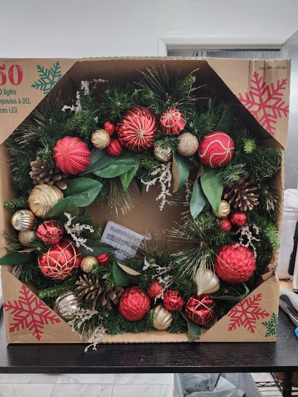 Photo 1 of Costco Christmas Holiday Grace Foliage, 30-inch Pre-Lit Artificial Wreath with 50 LED Lights Battery Operated!