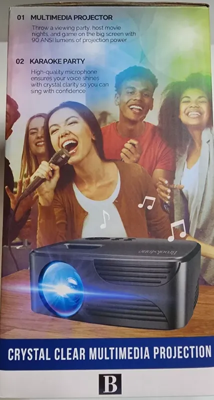 Photo 2 of Brookstone All-In-One Home Karaoke Projector Set with Microphone. You've always wanted to be the life of the party, and now you can this all-in-one home karaoke projector with microphone that lets you sing along with your favorite songs. It's got a built-