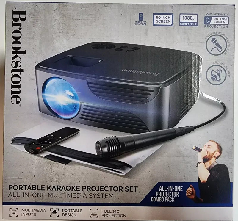 Photo 1 of Brookstone All-In-One Home Karaoke Projector Set with Microphone. You've always wanted to be the life of the party, and now you can this all-in-one home karaoke projector with microphone that lets you sing along with your favorite songs. It's got a built-