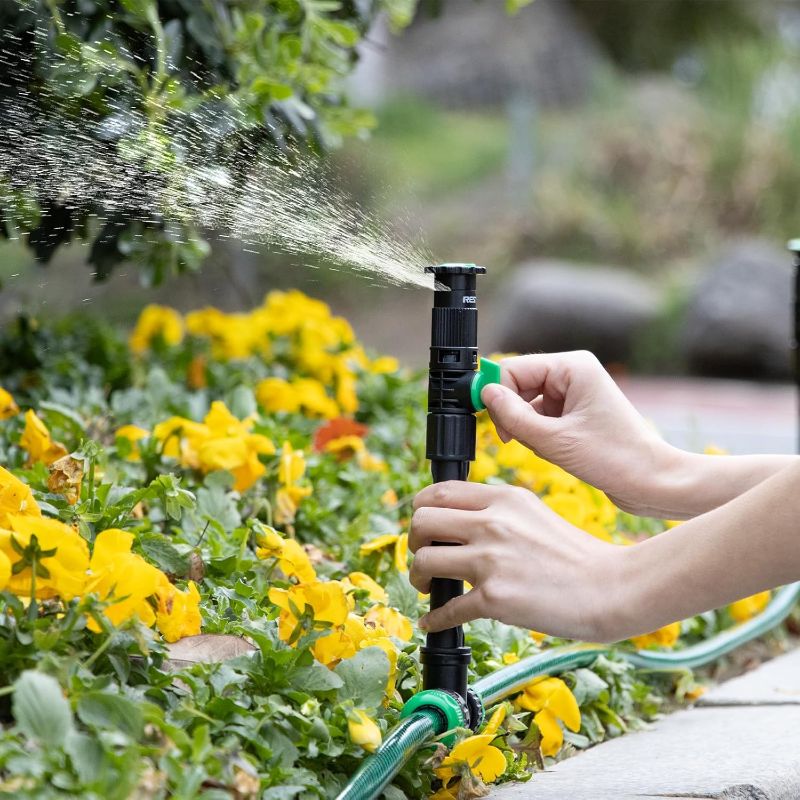 Photo 1 of RESTMO Flexible Sprinkler System, Above Ground DIY Irrigation Kit, Multi-Adjustable Lawn Sprinkler Set, Ideal for Plant and Flower Bed Watering, 50ft Garden Hose Included