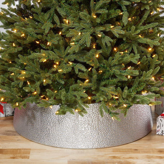 Photo 2 of Holiday Christmas Metal Tree Collar 35" Base x 10" Tall SILVER. rade in that old tree skirt and take the ironing out of hiding and protecting the base of your Christmas tree! Accommodates most trees with its 35” base diameter and 9.84” height. The tree co