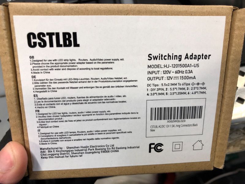 Photo 2 of CSTLBL AC/DC 12V 1.5A Power Supply Adapter Universal Charger Campatible with 5.5x2.1/2.5x10MM Plug and 1.5M Cable with Multiple Switching Connectors Black
