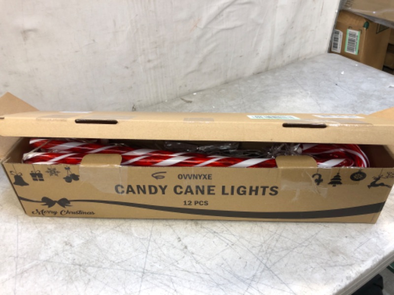 Photo 3 of 28” Candy Cane Lights Outdoor Pathway, 42 Feet in Total Length with 12 Pack Candy Cane Pathway Lights with Shiny Star for Outside Christmas Decorations, 10 LED Lights in Each Light Up Candy Canes
