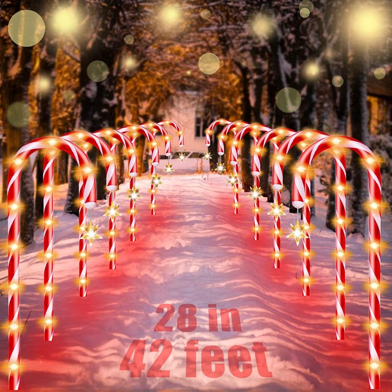 Photo 1 of 28” Candy Cane Lights Outdoor Pathway, 42 Feet in Total Length with 12 Pack Candy Cane Pathway Lights with Shiny Star for Outside Christmas Decorations, 10 LED Lights in Each Light Up Candy Canes
