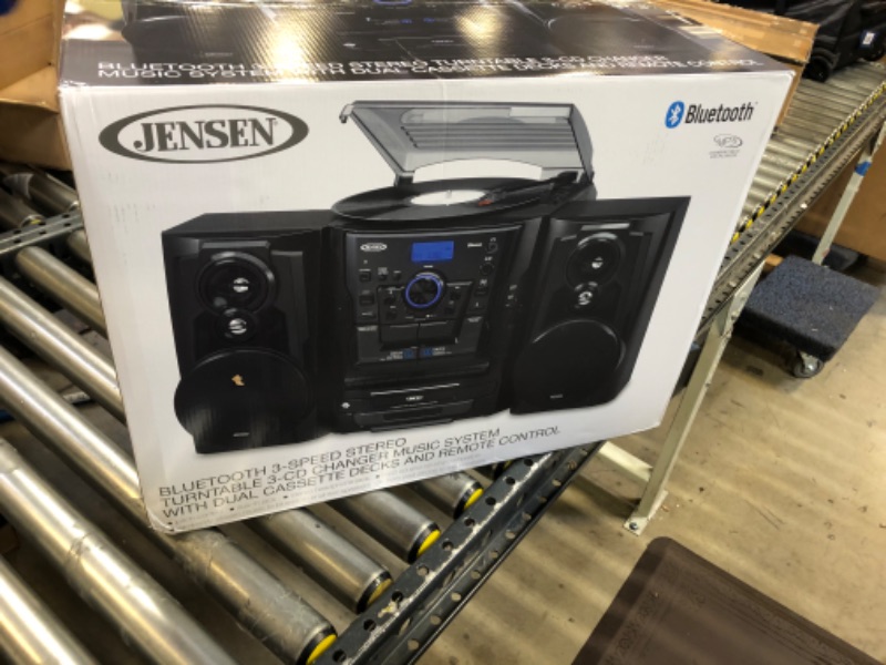 Photo 2 of Jensen® Bluetooth® 3 Speed Stereo Turntable 3 CD Changer Music System with Dual Cassette Deck, Pitch Control and Remote Control  ***OPENED FOR PICTURES***