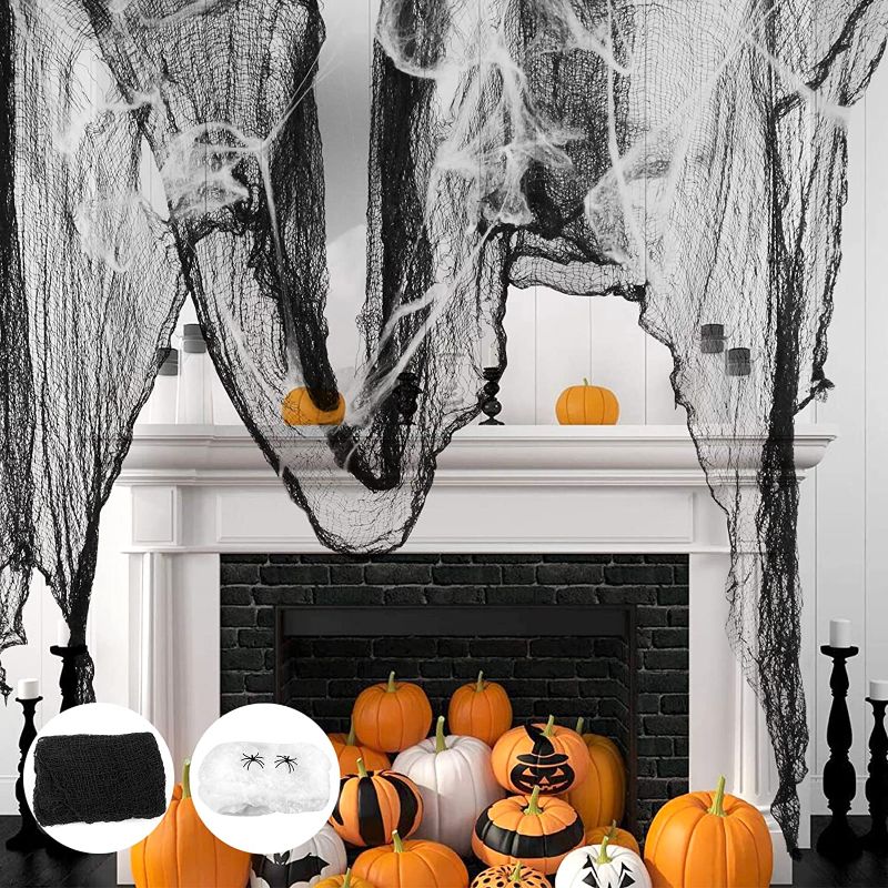 Photo 1 of 100g Super-White Stretching Spider Web can Stretch Over 200 Square Feet with 2 Fake Spiders+157 x 30 Inch Halloween Black Creepy Cloth for Halloween Decoration Outdoor (Black & White)
