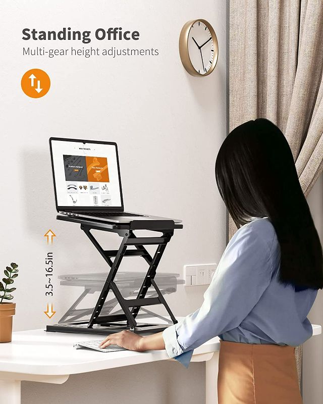 Photo 3 of HUANUO Adjustable Laptop Stand for Desk, Adjustable Height Laptop Riser - Easy to Sit or Stand with 9 Adjustable Angles, Portable Computer Stand Fits 15.6 Inch Laptop & Notebook
