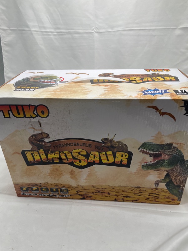 Photo 2 of Tuko Remote Control Dinosaur Toys LED Light Up Walking and Roaring Realistic Dinosaur Toys for 3-12 Years Old Boys and Girls (RC Dino)
