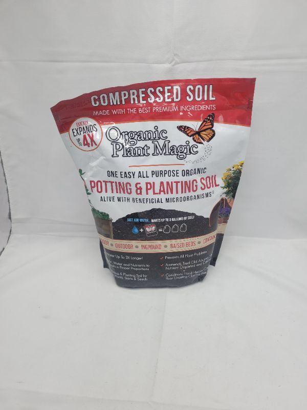 Photo 1 of Compressed Organic Potting Soil for Garden, Plants & Vegetables - Expands 4x When Mixed with Water - Indoor or Outdoor Use - Plant Food Mix Derived from Natural Coconut Coir & Worm Castings Fertilizer 2lb