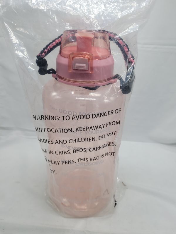 Photo 2 of Giotto Large 1 Gallon Motivational Water Bottle with Paracord Handle and Removable Straw - Leakproof Tritan BPA Free Fitness Sports Water Jug with Time Marker to Ensure You Drink Enough Water Daily