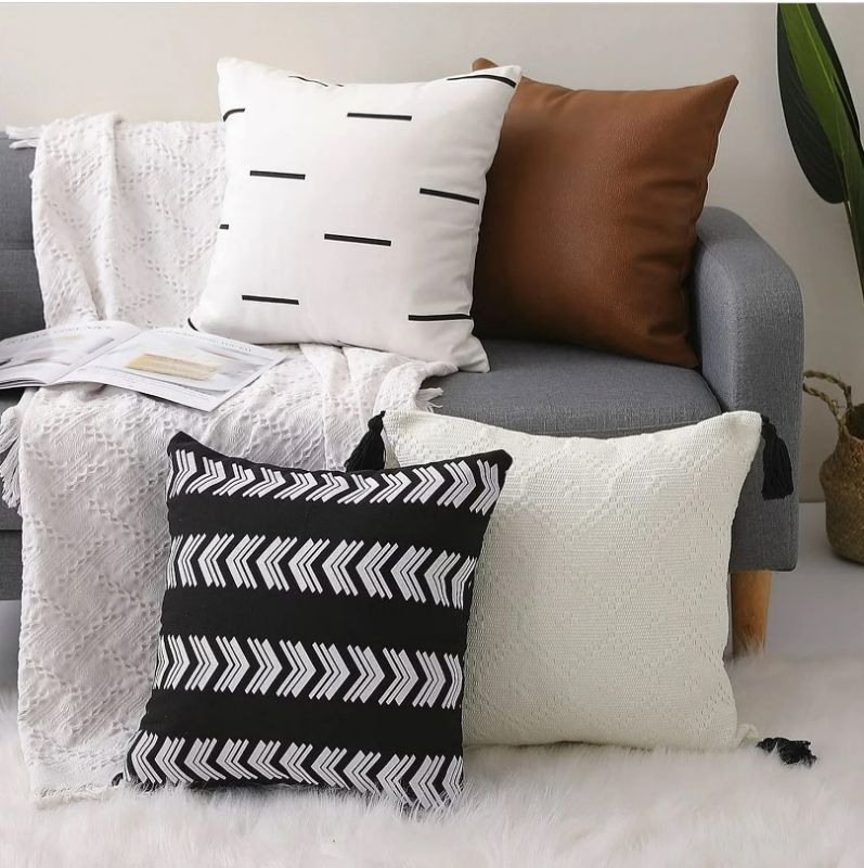 Photo 1 of KKY Boho Throw Pillow Cover 18x18 inch Set of 4, Modern Design Geometric Stripes and Artificial Leather, Used for Farmhouse Living Room Sofa or Bed.(Multi 4pc, Square 18x18 inches)…