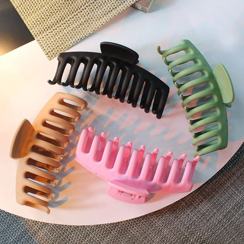 Photo 1 of Big Hair Claw Clips 4 Pack Large Banana and Jaw Clips for Women Ladies Girls Matte Nonslip Hair Holder Hair Accessories for Thick Long Heavy Hair 4.3 inch