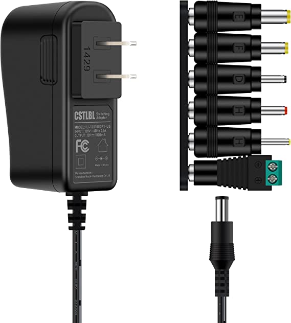 Photo 1 of CSTLBL AC/DC 12V 1A Power Supply Adapter Universal Charger Campatible with 5.5x2.5x10MM Plug and 2M Cable with Multiple Switching Connectors Black