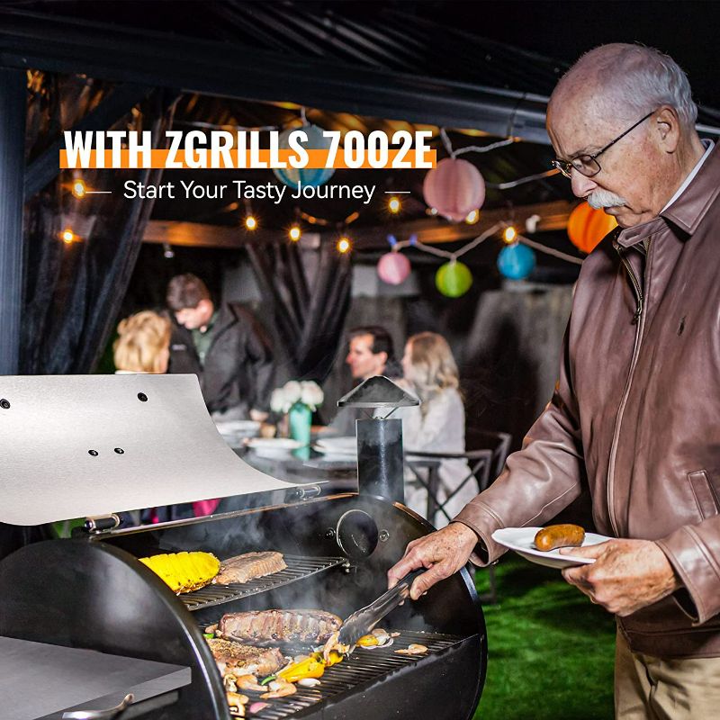 Photo 1 of Z Grills Wood Pellet Grill & Smoker, 8 in 1 BBQ Grill for Outdoor Cooking, Auto Temperature Control, 697 sq in Cooking Area, 7002E
