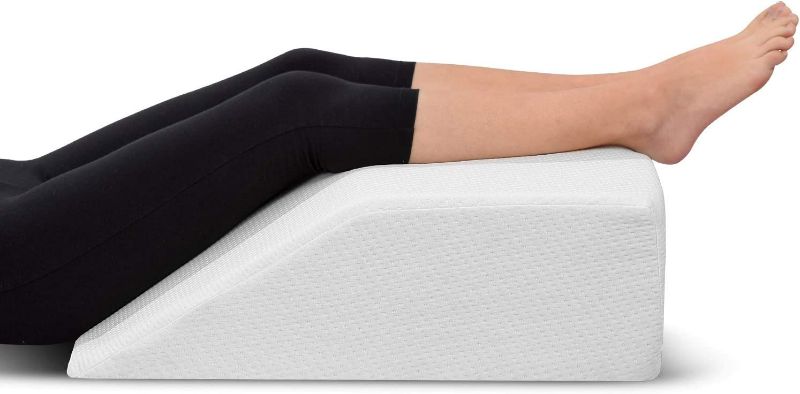 Photo 1 of Leg Elevation Memory Foam Pillow with Removeable, Washable Cover - Elevated Pillows for Sleeping, Blood Circulation, Leg Swelling Relief and Sciatica Pain Relief - Pillow for Back Pain and Pregnancy