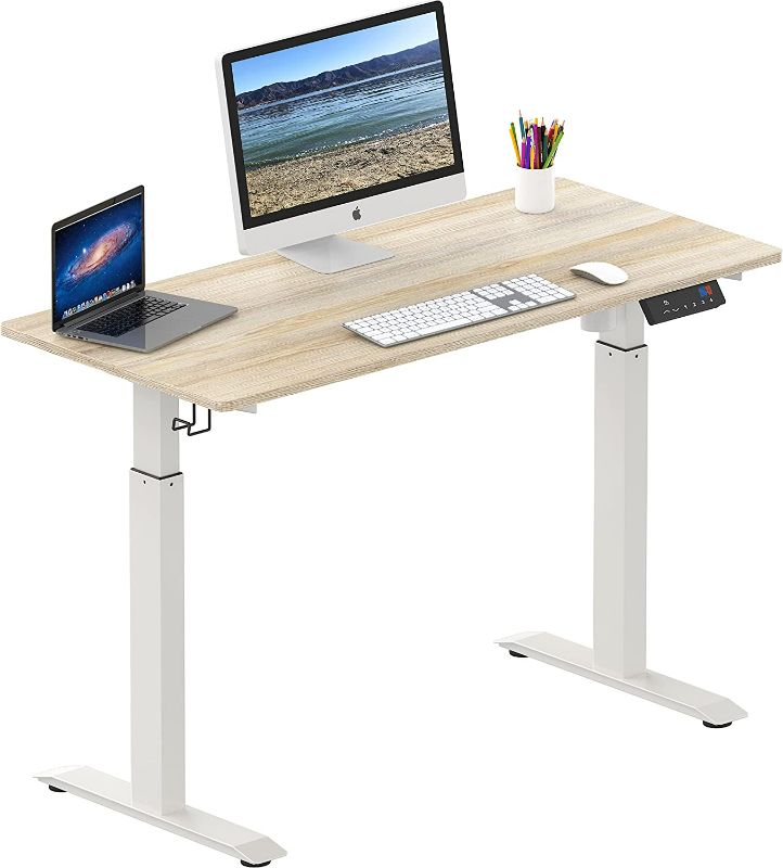 Photo 1 of 55-Inch Large Electric Height Adjustable Standing Desk, 55 x 28 Inches,maple