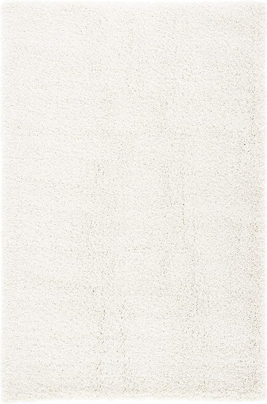 Photo 2 of SAFAVIEH Milan Shag Collection 4' x 6' Ivory SG180 Solid Non-Shedding Living Room Bedroom Dining Room Entryway Plush 2-inch Thick Area Rug
