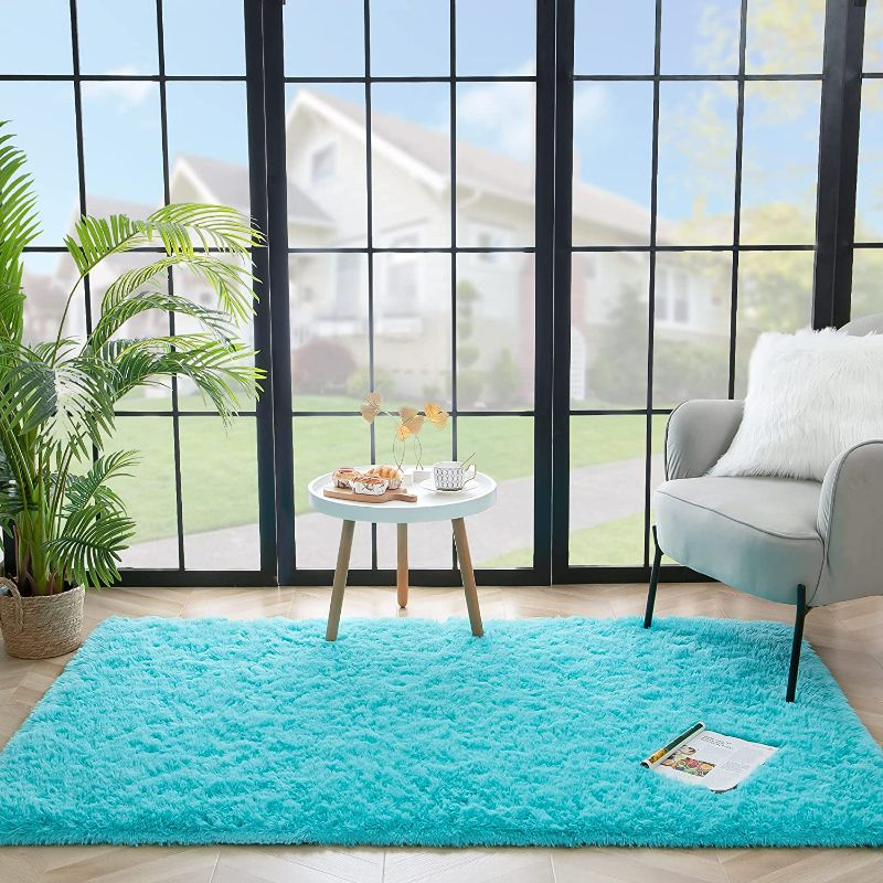 Photo 2 of Rostyle Super Soft Fluffy Area Rugs for Bedroom Living Room Shaggy Floor Carpets Shag Christmas Rug for Girls Boys Furry Home Decorative Rugs, 4 ft x 6 ft, Teal Blue
