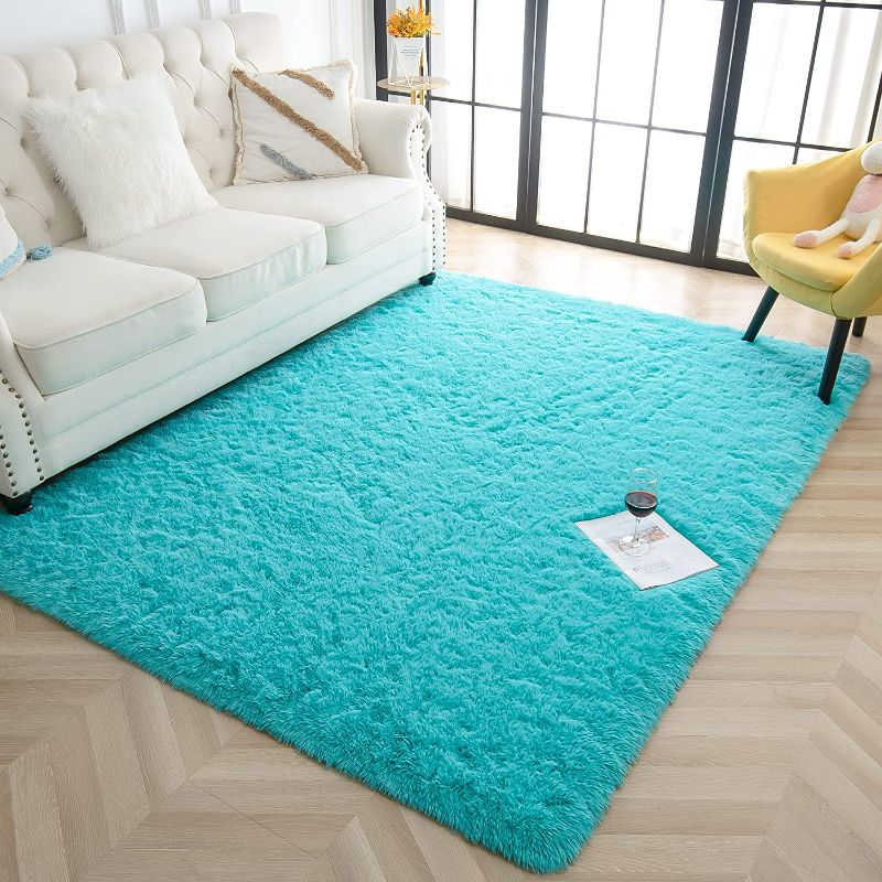 Photo 1 of Rostyle Super Soft Fluffy Area Rugs for Bedroom Living Room Shaggy Floor Carpets Shag Christmas Rug for Girls Boys Furry Home Decorative Rugs, 4 ft x 6 ft, Teal Blue
