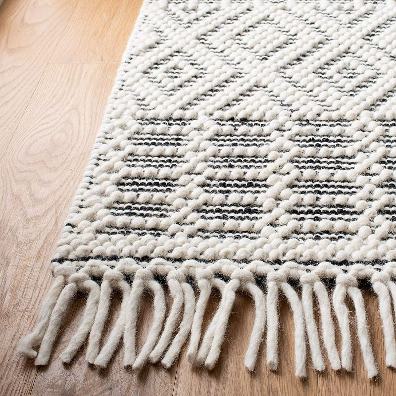 Photo 3 of SAFAVIEH Natura Collection 6' x 9' Ivory / Black NAT852Z Handmade Moroccan Boho Fringe Wool Area Rug
