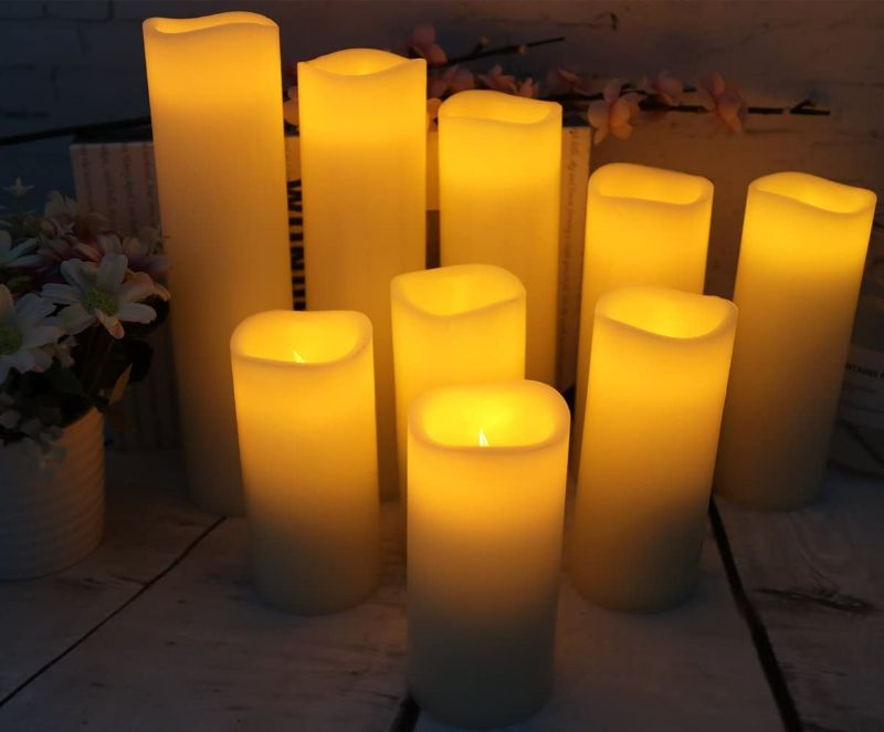 Photo 2 of Vinkor Flameless Candles Battery Operated Candles 4" 5" 6" 7" 8" 9" Set of 9 Ivory Real Wax Pillar LED Candles with 10-Key Remote and Cycling 24 Hours Timer
