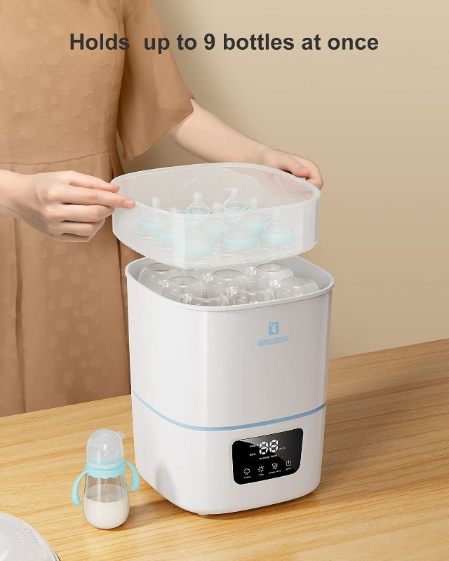 Photo 5 of CocoBear 3-in-1 Electric Steam Sterilizer and Dryer Premium for up to 9 Baby Bottles, Pacifiers, Pumps and Accessories, Compact Design, Holds Wide Narrow and Angled Bottles
