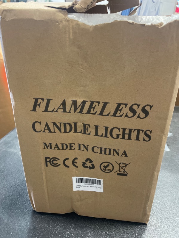 Photo 2 of YIWER Flameless Candles Set of 9 Ivory Dripless Real Wax Pillars Include Realistic Dancing LED Flames and 10-Key Remote Control with 24-Hour Timer Function 400+ Hours ?9? Y-02,ivory?1*9 Real Wax With 2 Remotes("dancing" Flame)