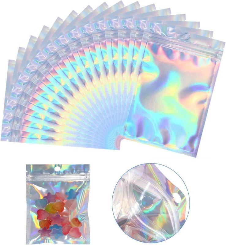 Photo 1 of 100 Pack Resealable Smell Proof Bags Mylar Bags Aluminum Foil Packaging Plastic Bag,Small Mylar Storage Bags for Candy,Jewelry,Party,Holographic Rainbow...