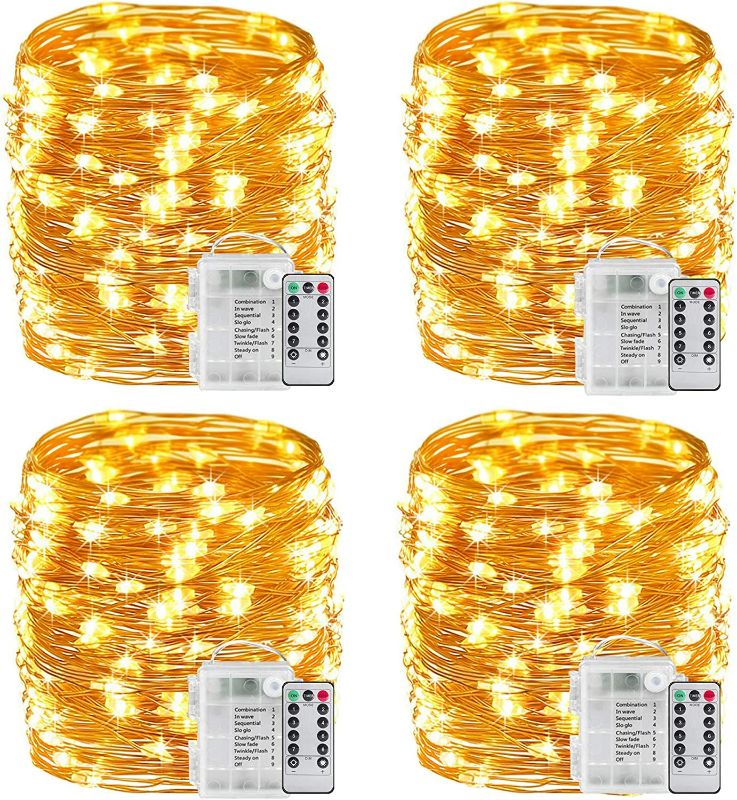 Photo 1 of YITING 4 Pack 33Ft 100 LED Fairy Lights Battery Operated with Remote Control Timer 8 Modes Waterproof Copper Wire Twinkle String Lights, for Bedroom Wedding Chirstmas Decor(Warm White) New
