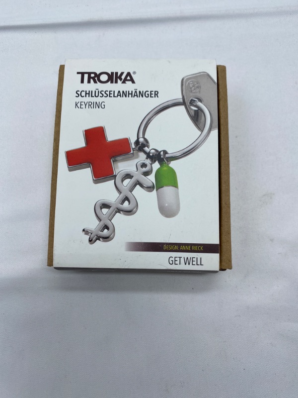 Photo 2 of TROIKA key ring "get well", shiny chrome plated, key ring with 3 charms: Asclepius staff, red cross and pill, the original by TROIKA