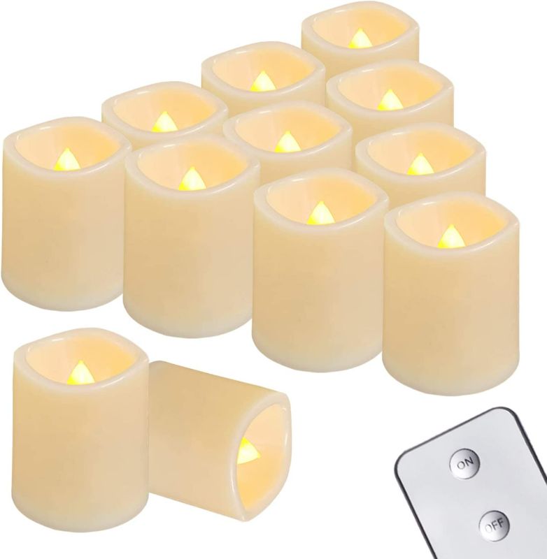 Photo 1 of Homemory Flameless Votive Candles with Remote, 12Pack Flickering Battery Operated LED Tealight Candles, Realistic Fake Candle for Wedding, Halloween, Christmas Decorations (Battery Included) NEW 