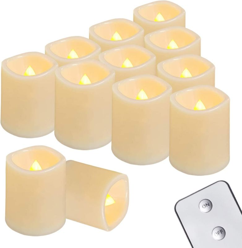 Photo 1 of Homemory Flameless Votive Candles with Remote, 12Pack Flickering Battery Operated LED Tealight Candles, Realistic Fake Candle for Wedding, Halloween, Christmas Decorations (Battery Included) NEW