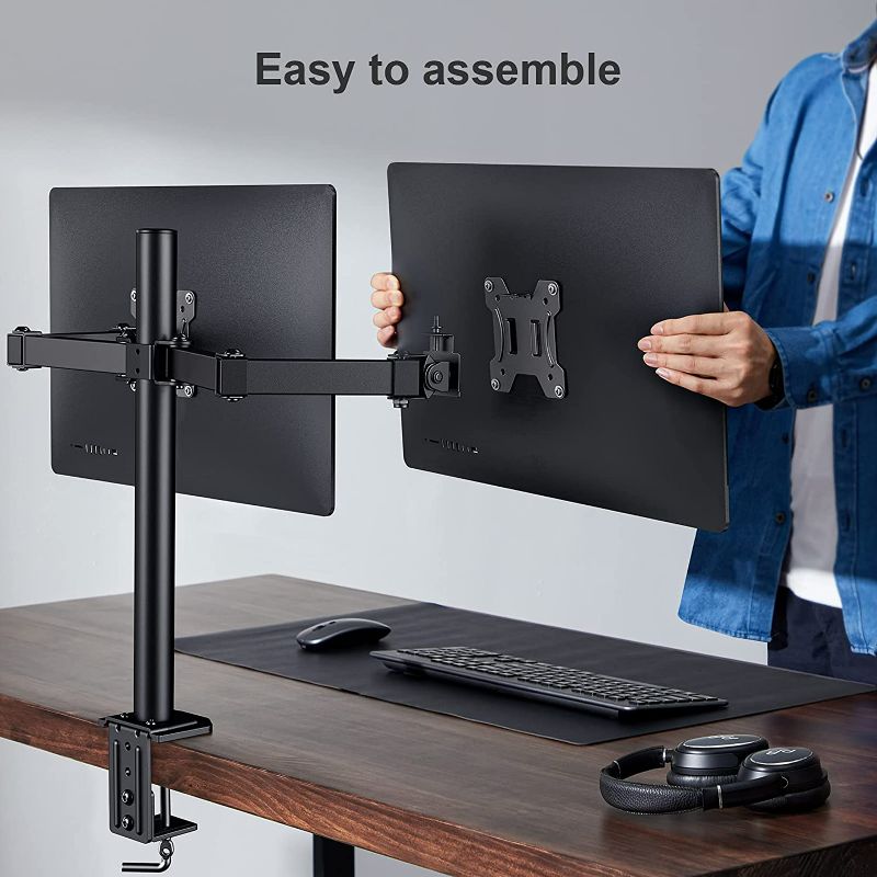 Photo 2 of HUANUO Dual Monitor Arms Desk Mount for 13 to 27 inch, Heavy Duty Fully Adjustable Monitor Stand for 2 Monitor, 75x75mm/100x100mm VESA Mount with C Clamp/Grommet Mount, Holds up to 17.6lbs Per Arm NEW