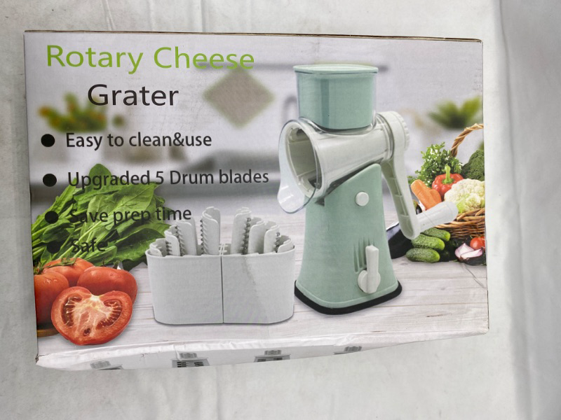 Photo 2 of Manual Rotary Cheese Grater - Round Mandoline Slicer with Strong Suction Base, Vegetable Slicer Nuts Grinder Cheese Shredder Green NEW