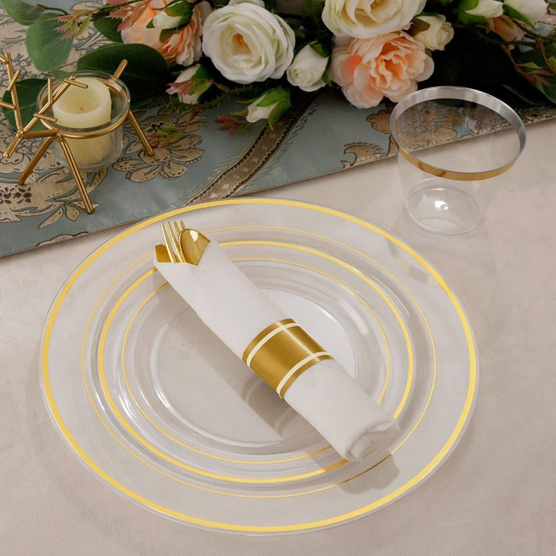 Photo 2 of I00000 210Pcs Clear Gold Plastic Plates, Gold Plastic Plates and Gold Dinnerware Includes: 30 Dinner Plates 10.25", 30 Dessert Plates 7.5", 30 Gold Cups, 30 Per Rolled Napkins with Cutlery for Party. NEW 