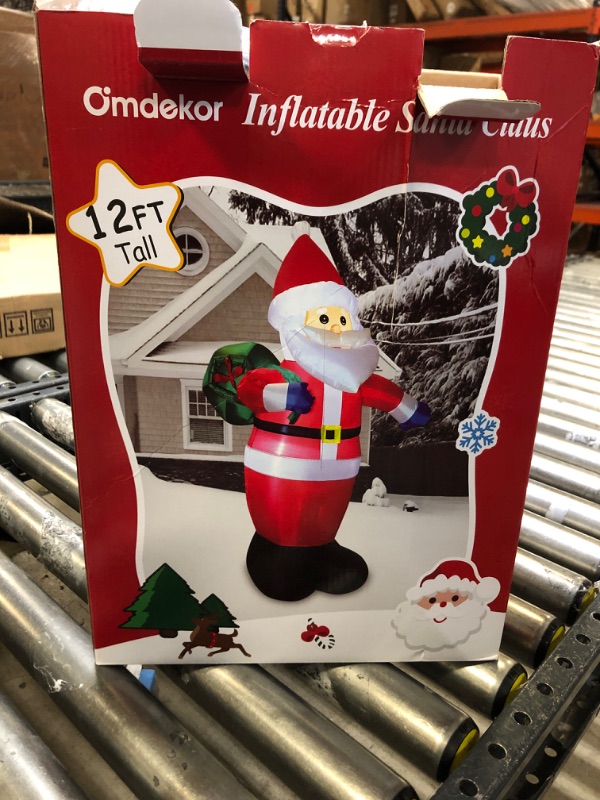 Photo 3 of 12 Feet Giant Christmas Inflatable Santa Claus Outdoor Yard Decorations, Blow up Santa Claus with Gift Bag, Huge Santa Carrying Present Sack, Outside Waterproof Xmas Decor for Party Garden Hall Plaza 12FT Inflatable Santa Claus