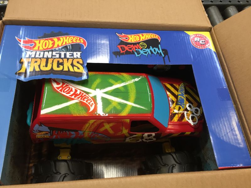 Photo 1 of ?Hot Wheels RC Monster Trucks 1:15 Scale HW Demo Derby, 1 Remote-Control Toy Truck with Terrain Action Tires, Toy for Kids 4 Years Old & Older HW DEMO DERBY RC
