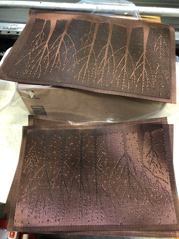 Photo 2 of 6 shimmery brown placemats , shows a woods scene 