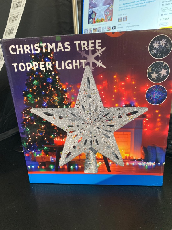 Photo 2 of WinPull Christmas Tree Topper Lighted with 6 Pattern Projection Modes, Christmas Star Tree Topper Built-in LED Rotating Lights, 3D Glitter Projector for Christmas Decorations (Silver)
