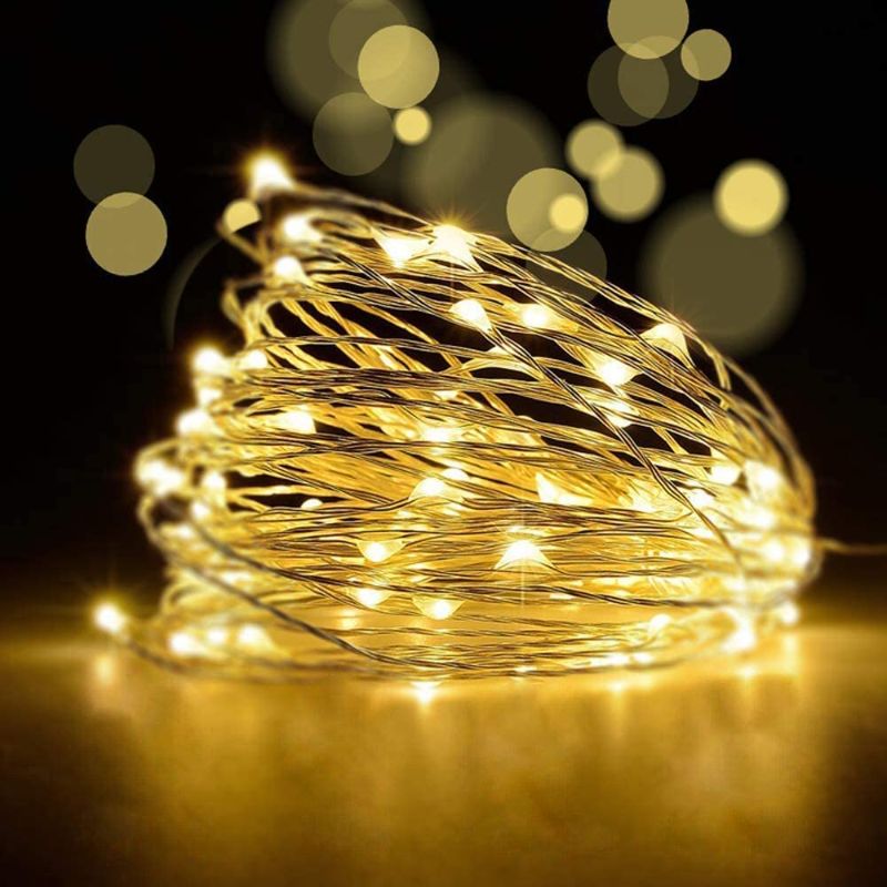 Photo 1 of YoTelim LED Fairy String Lights with Remote Control - 2 Set 100 LED 33ft/10m Micro Silver Wire Indoor Battery Operated LED String Lights for Garden Home Party Wedding Festival Decorations(Warm White)