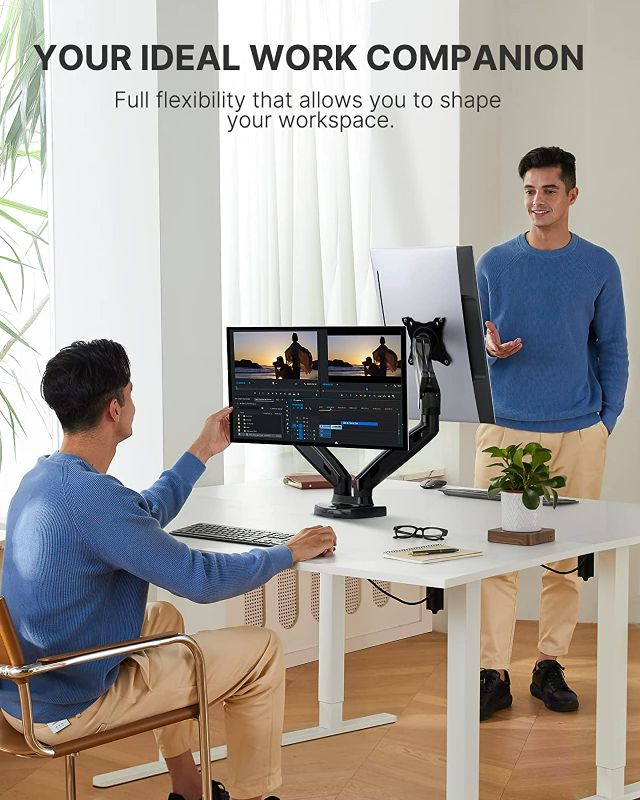 Photo 2 of HUANUO Dual Monitor Stand, Adjustable Spring Monitor Desk Mount for 13-27 inch, Dual Monitor Mount Holds Max 14.3lbs, Computer Monitor Arms with Wide Range of Motion for Home Office NEW