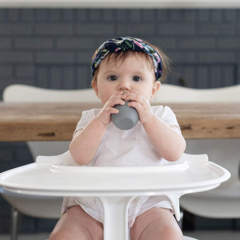 Photo 2 of ezpz Tiny cup  (Coral) - 100% Silicone Cup, Spoon & Bowl with Built-in Placemat for First Foods + Baby Led Weaning + Purees - Designed by a Pediatric Feeding Specialist - 4 Months+ NEW 