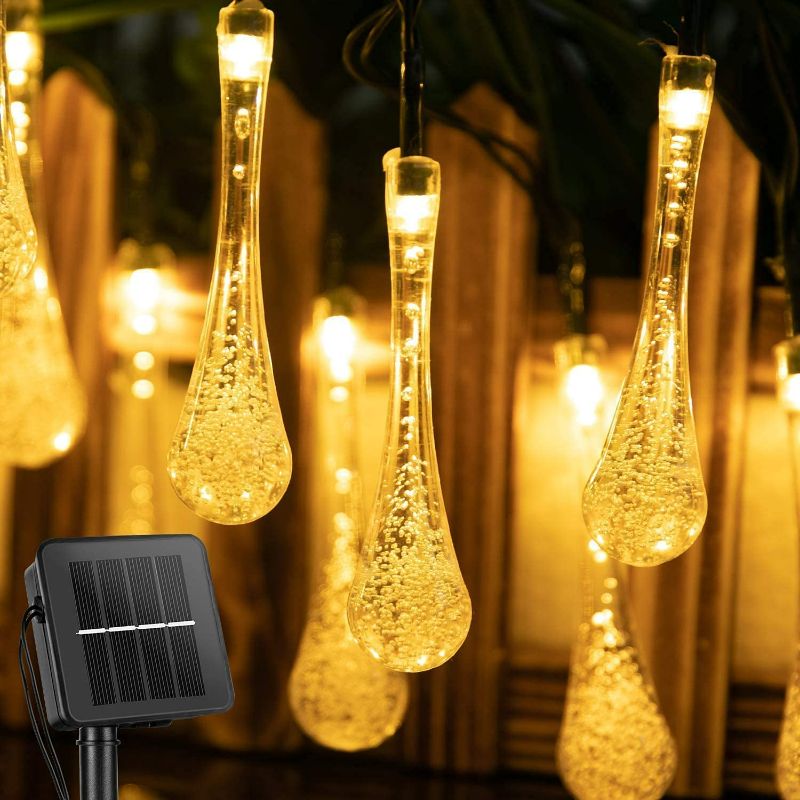 Photo 1 of Solar String Lights Outdoor Waterproof 25.7 Feet 40 Led Water Drop Solar Powered Lights, Crystal Lights for Patio Garden Yard Tree Wedding Party Decor, Warm White NEW
