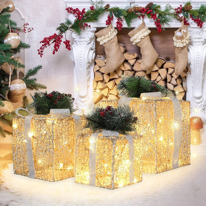 Photo 1 of DROFELY Christmas Lighted Gift Box set 11.8in Larger Size Champagne Color Box with Silver Bow Set of 3pcs Decoration Light Up for Decorate Christmas Tree Indoor Outdoor Present Box for Holiday display NEW