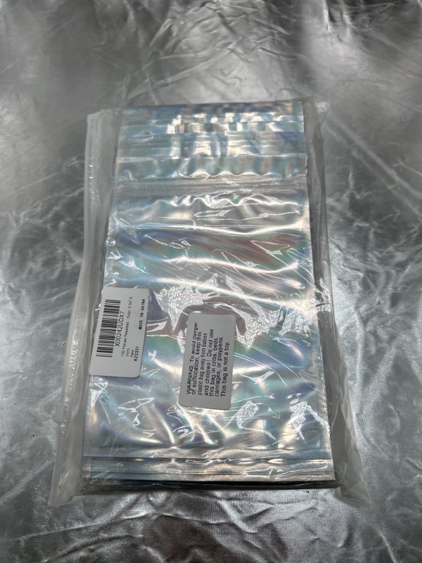 Photo 5 of 100 Pieces Bags Holographic Packaging Bags Storage Bag for Food Storage (Holographic Color, 5.5 x 7.8 Inches)