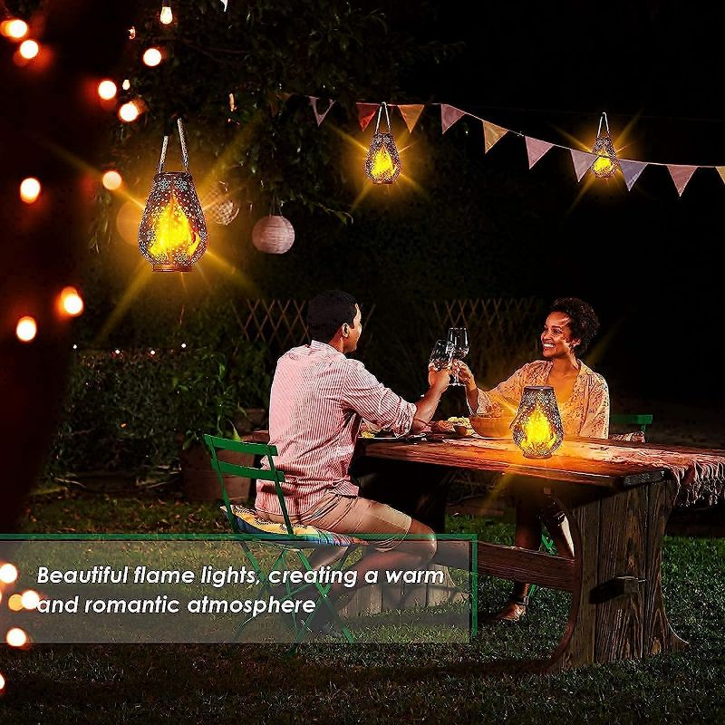 Photo 5 of (2 Pack) TomCare Solar Lights Flickering Flame for Patio Garden Deck Yard